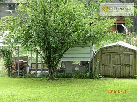 Shed and Chain Link enclosure for garden or pets