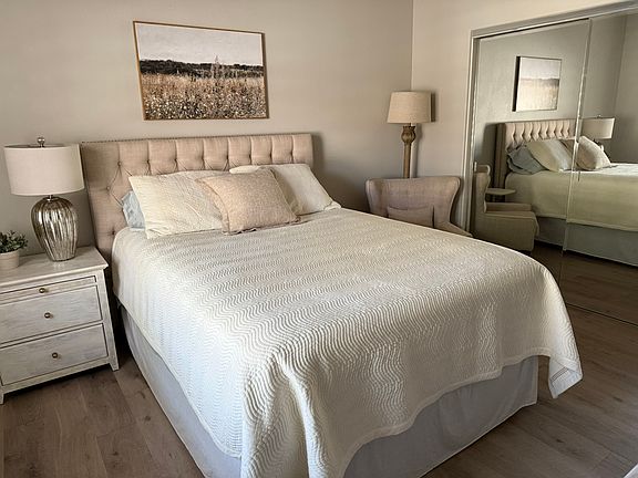 Queen size bed fully furnished. Rug available if you would like to use it.