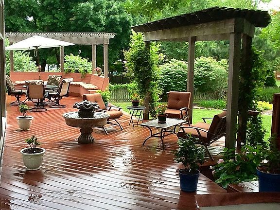 deck with built in fountain, hot tub and 2 pergolas