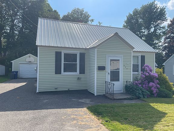 Small detached garage to the left