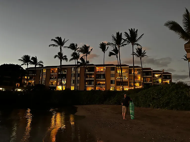 Nighttime shot of building from baby beach out front.