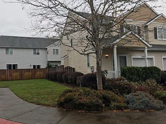 West side of home w/grass area