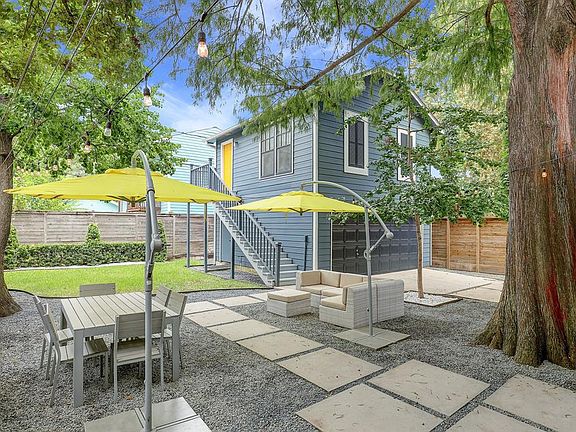 BACK YARD: The oversized yard creates a wonderful space to gather and entertain while still having room for a future pool if desired.