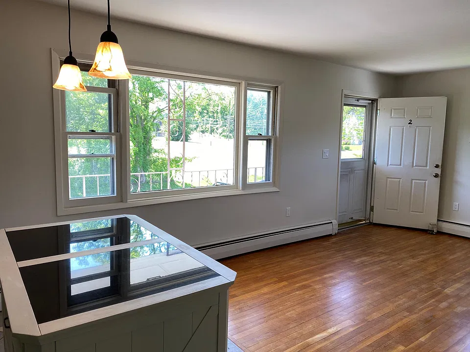 New kitchen island with granite top. New lighting. Great light! Balcony