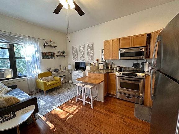 This apt's kitchen is white