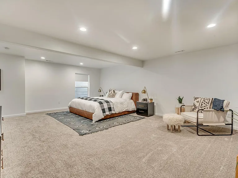 Large Lower Level with Oversized Storage Closet and Built in Cabinetry