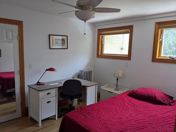 East bedroom with queen-size bed