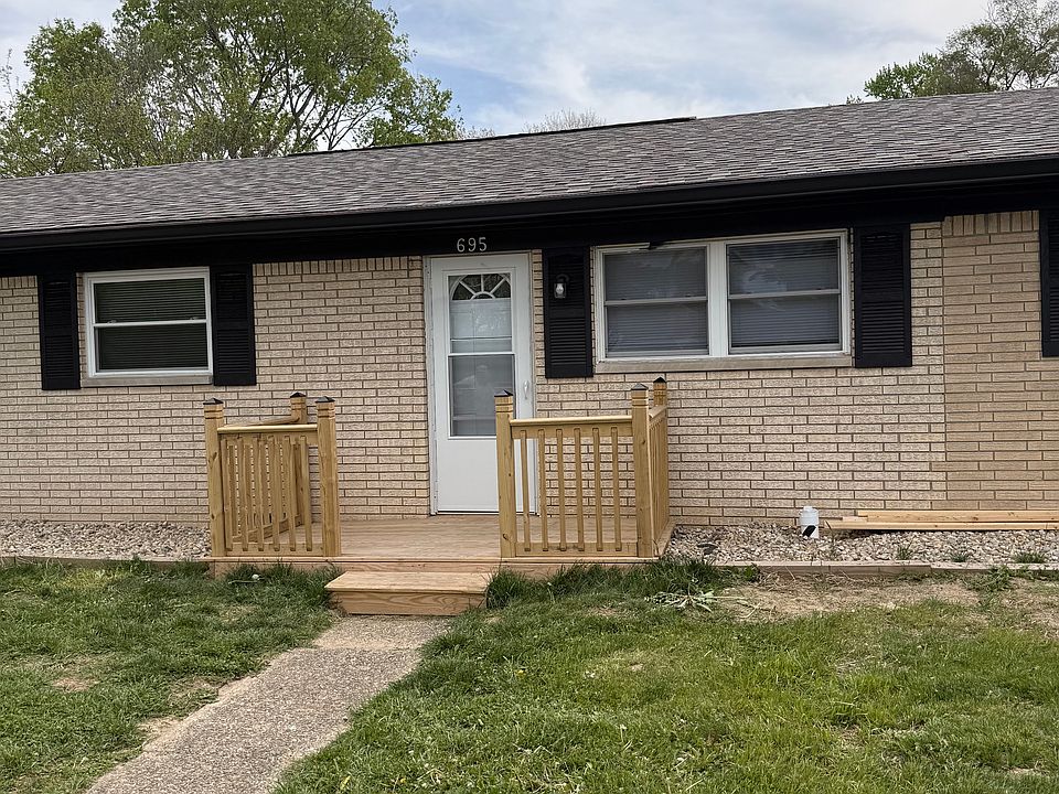 Entrance to the home. Front deck for lounging. Parking right at your front door