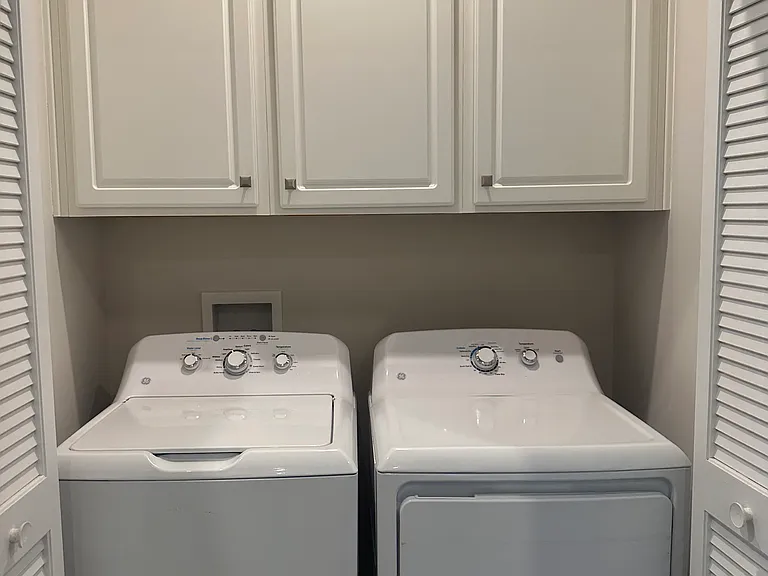 Laundry includes large capacity washer and dryer