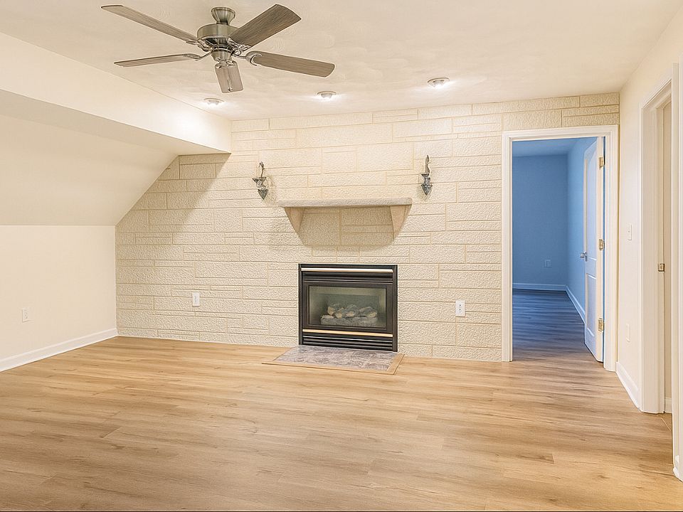 Living room area with gas fireplace.