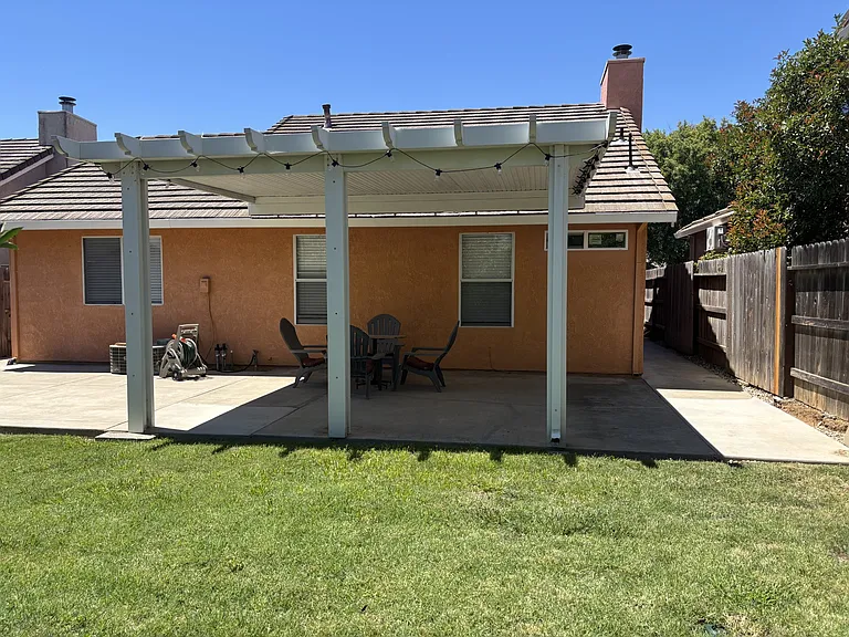 Big backyard with a patio