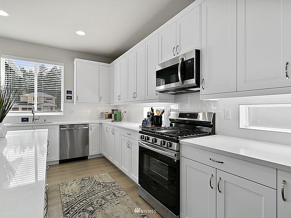 Pictures are of a another built Rush floor plan and are used to demonstrate the quality features and finish of a Rush Home. They may display pictures of upgrades and or materials no longer available.