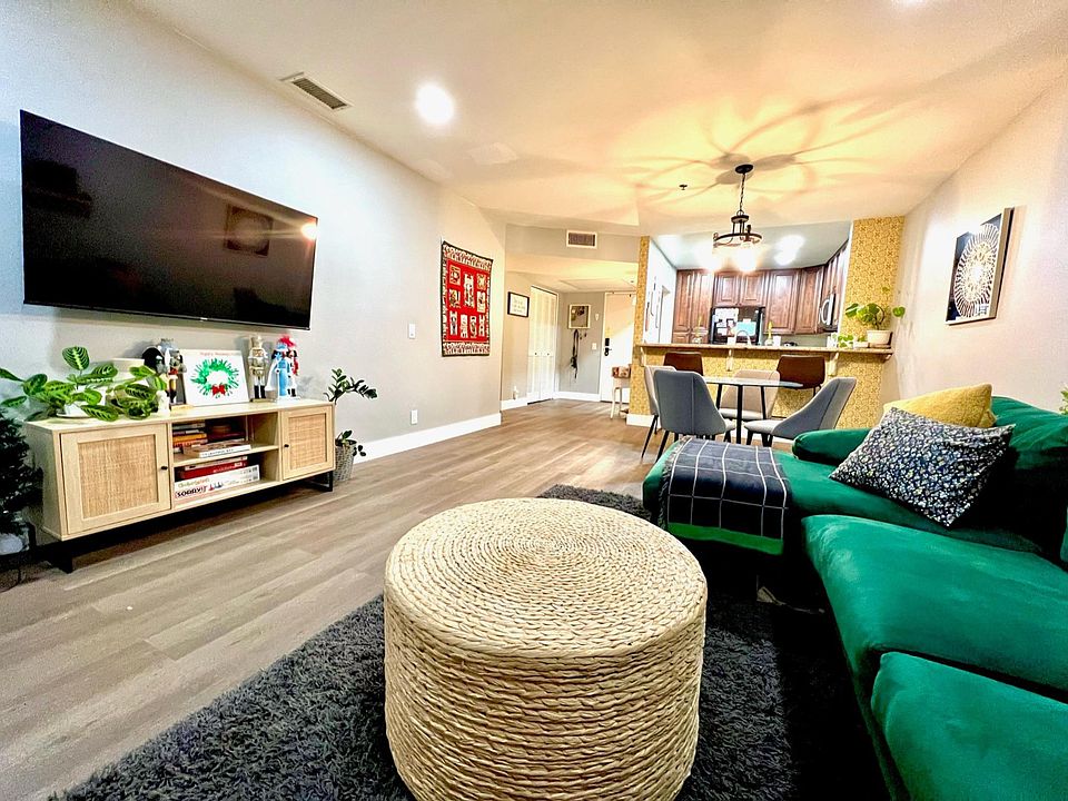 Large spacious living area with an open concept to the kitchen. Beautiful upgraded flooring with lots of light.
