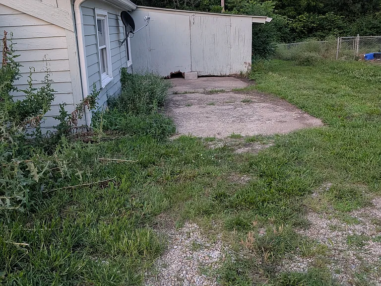 Carport with doors