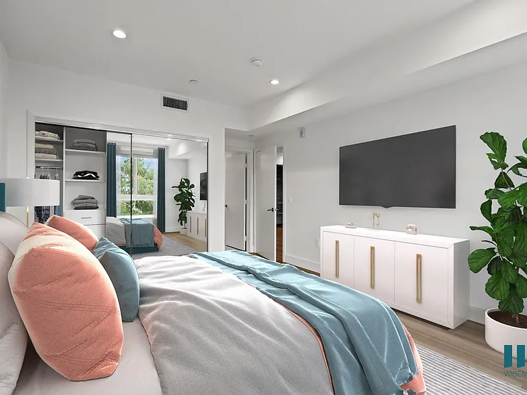 Bedroom with Mirrored Closet with Shelving, Vinyl Flooring, and Recessed Lighting