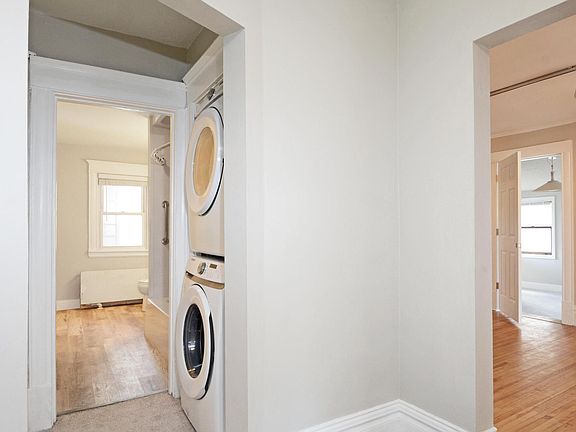 In unit stacked washer and dryer