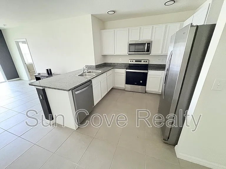 3180 Suncoast Plains Dr — Photo 4