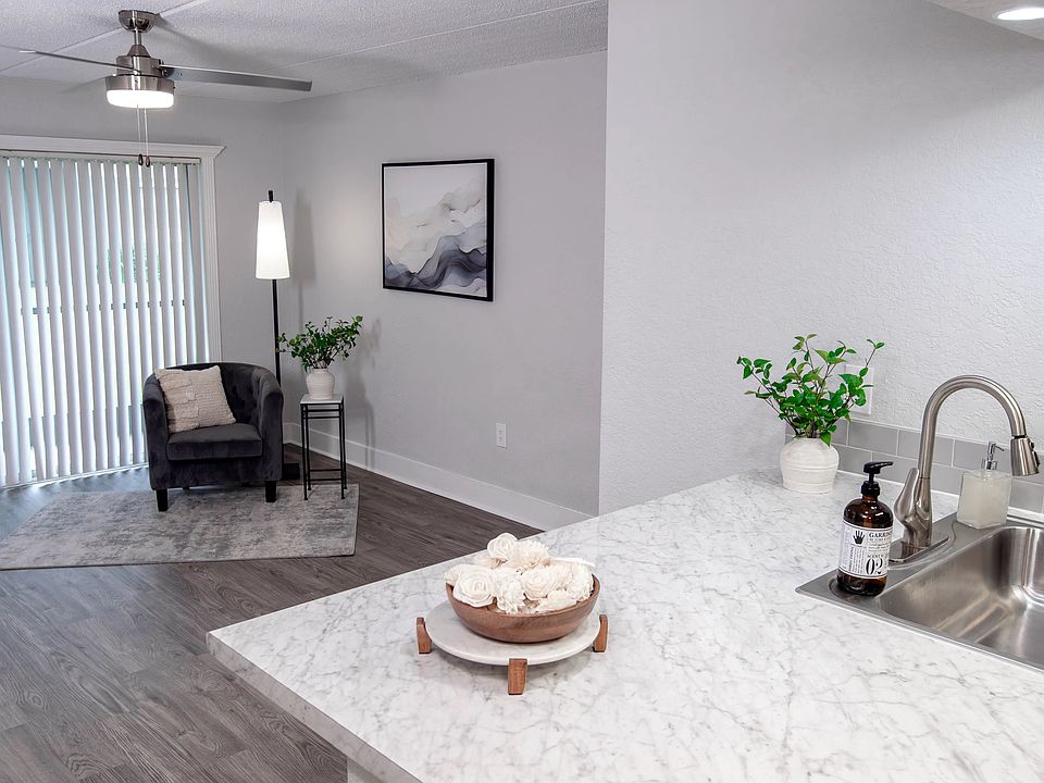 Enjoy an open living space that extends to your private patio or balcony through sliding glass doors, offering natural light and a seamless indoor-outdoor flow. Perfect for relaxation and entertaining.