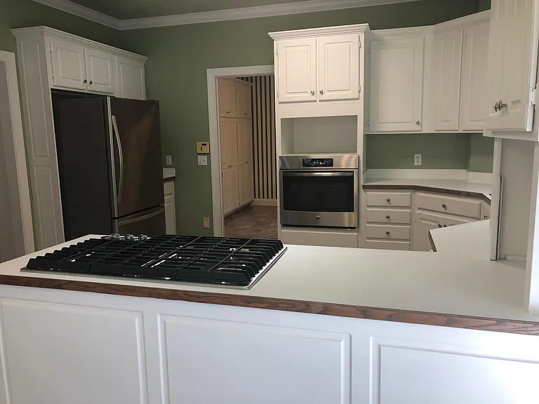 View of kitchen from breakfast area