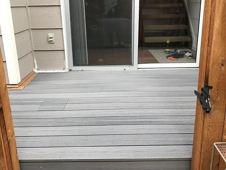 Back patio and greenbelt gate