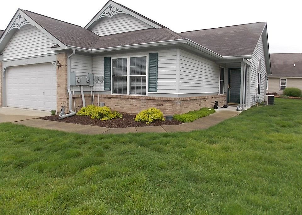 Lovely plus immaculate 2BD 2BA condo with den & 2 car attached garage.