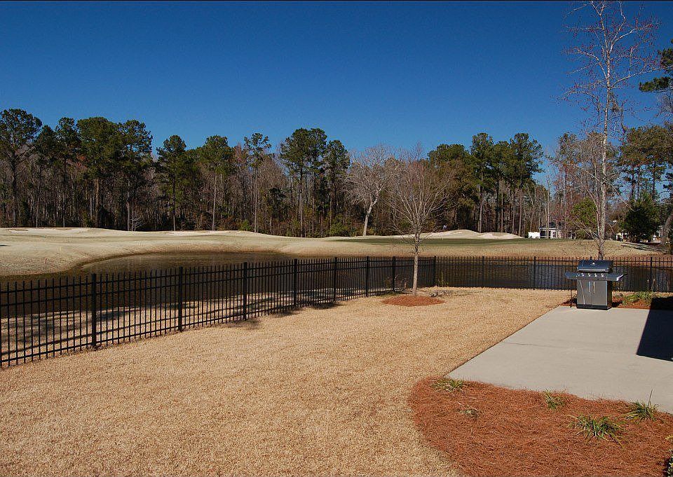 Spectacular wraparound lagoon to golf views