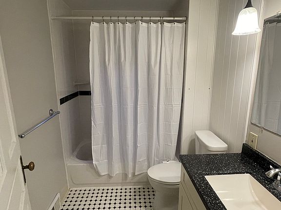 Tiled shower large vanity with extra storage