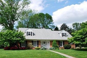 Classic Cape Cod with 4 BRs & 2 car garage