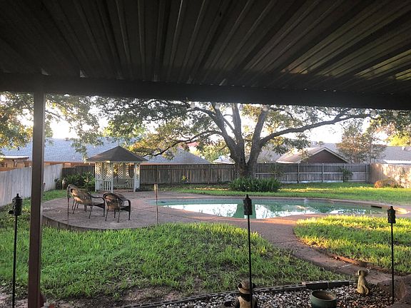 Taken in Spring. Patio furniture and lawn decorations not included.