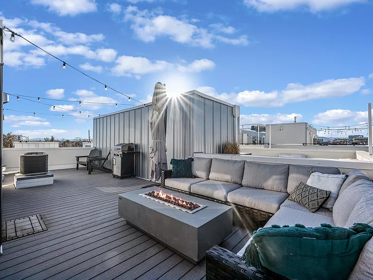 Private Roof Deck with Dimmable String Lights