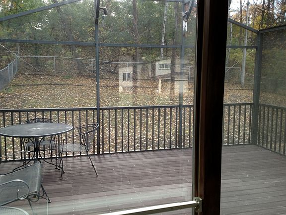 Windows and light surround the 3 season porch where you'll l