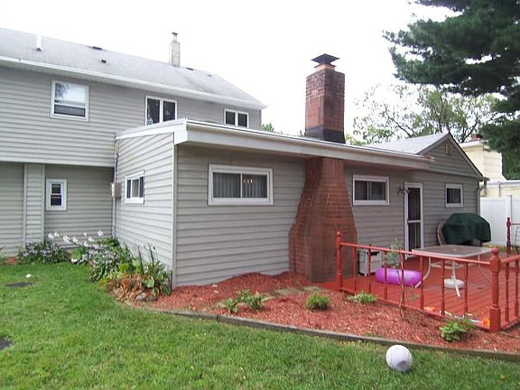 Fenced Rear Yard with Custom Deck