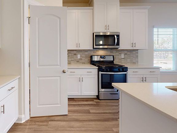 The Manchester s stunning kitchen offers plenty of counterspace for the at-home chef.
