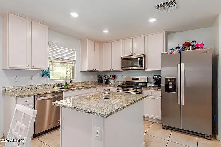 8216 W Albeniz Pl — Photo 8