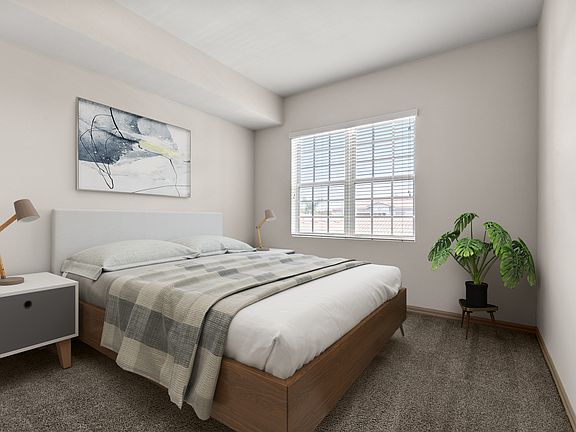 Retreat to a bedroom built for relaxation.