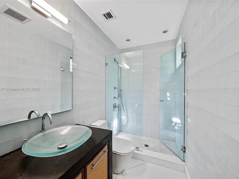 227 E Dilido Dr — Photo 79