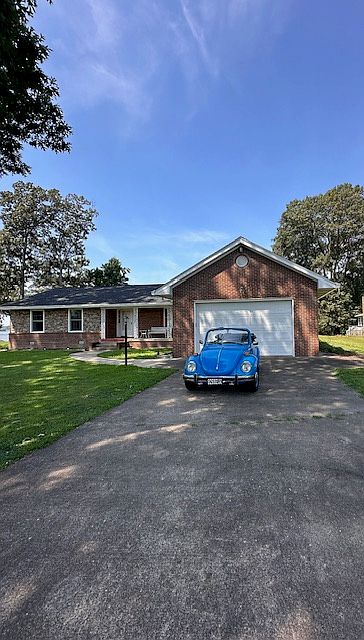Lovely Water Front Home with Over Size Double Car Garage