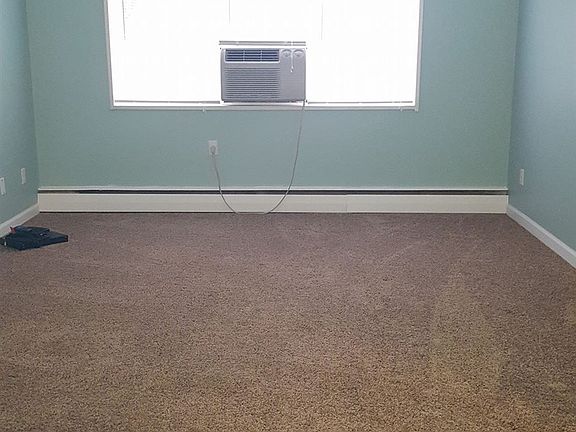 living room alot of light pouring in