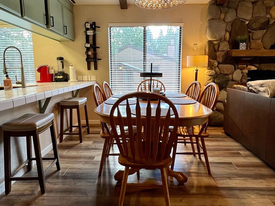 windows off of kitchen and living room view heavenly mountains and the beautiful pines. The area is the back of Lake Village which is quiet and peaceful.
