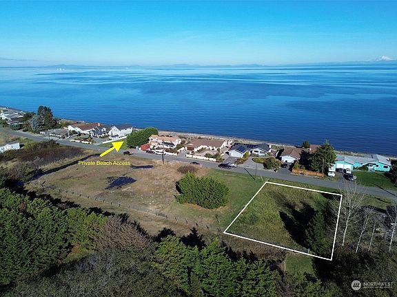 Private beach access located just across the street.>