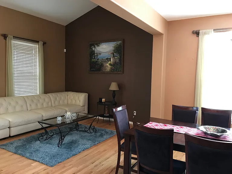 Living room before new paint and with furniture