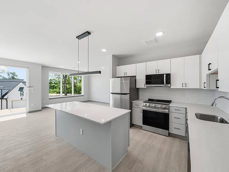 A4 _ One Bedroom plus Den Kitchen and Living