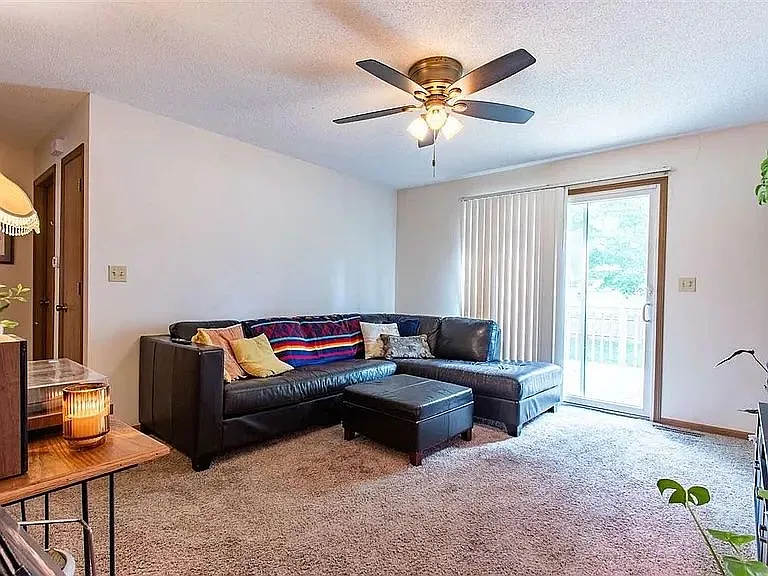 Sliding door in living rom goes out to deck / yard