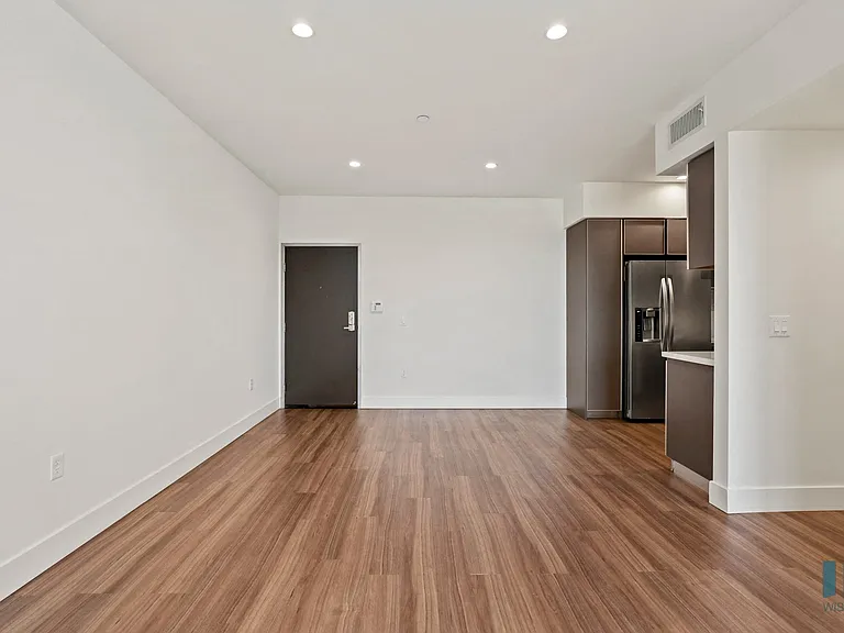 Front Entrance and Open-Concept Kitchen and Dining Space