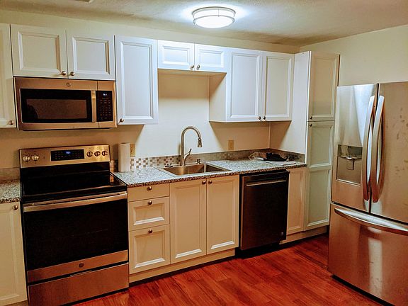 All new kitchen appliances and cabinets