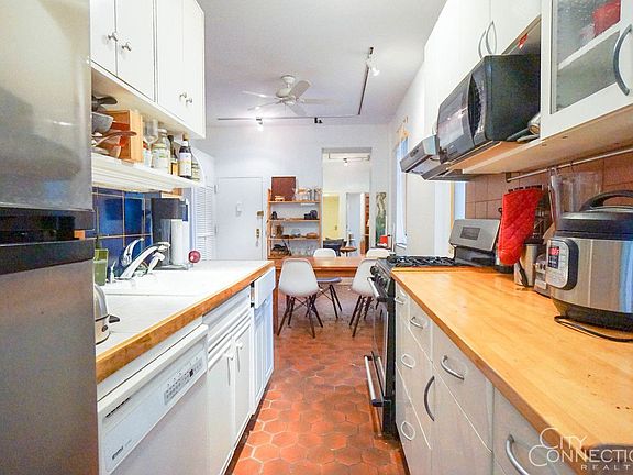 2nd image of 115 E 2nd St APT 3