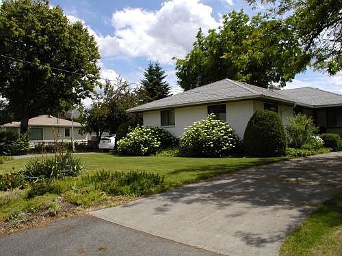 View from street. 2 driveways