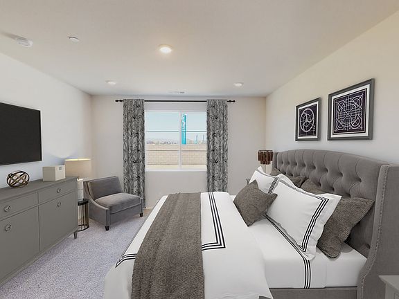 Residence 2 primary suite modeled at a nearby Meritage community.