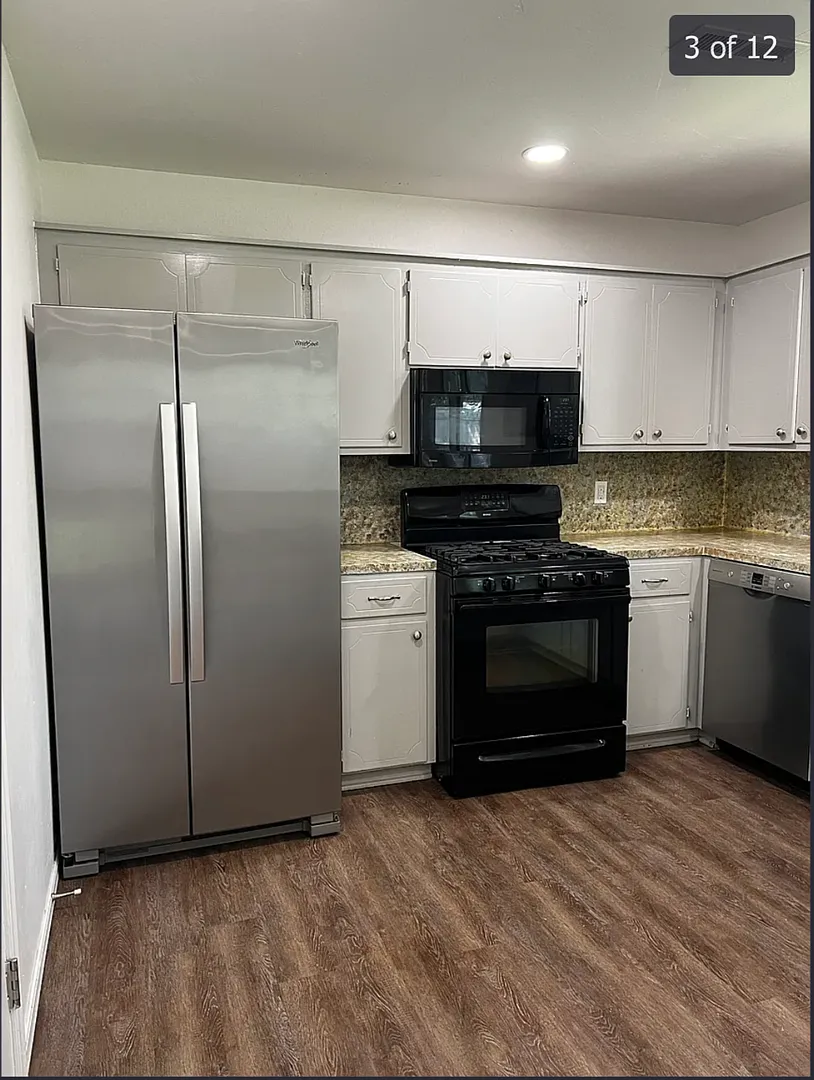 Updated 3 Bed, 2 Bath Home with Fireplace, Fenced Yard & 2-Car Garage — Photo 3