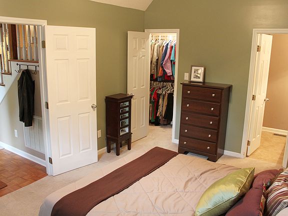 Master w/ walk-in closet.